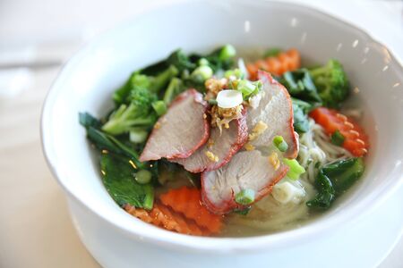 Noodle and dumpings with red pork