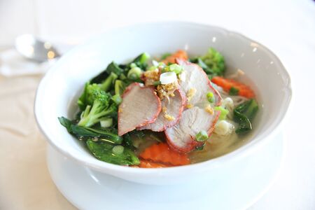 Noodle and dumpings with red pork