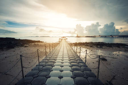 beach with bridge in long exposureの写真素材