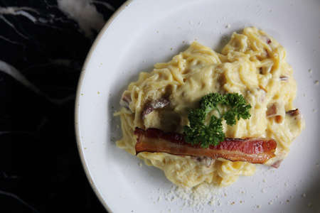 Spaghetti white sauce with bacon and cheeseの写真素材