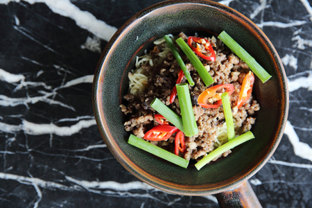 Fried minced pork with noodleの写真素材