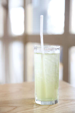 iced green tea on woodの写真素材