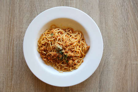 spaghetti bolognese meat sauce on woodの写真素材