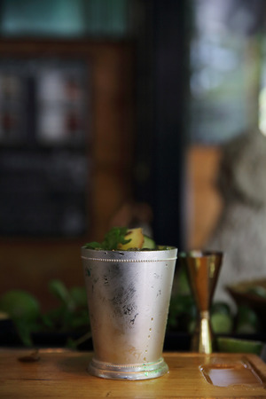 Mojito cocktail drink with mint and lemon backgroundの写真素材
