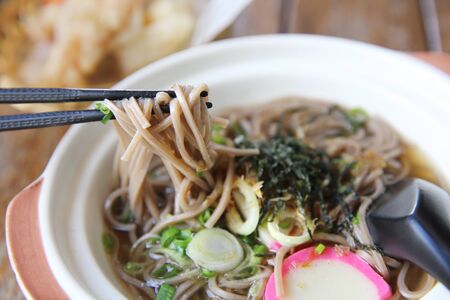 tempura soba noodle with fried shrimp and vegetables on wood background , Japanese foodの写真素材
