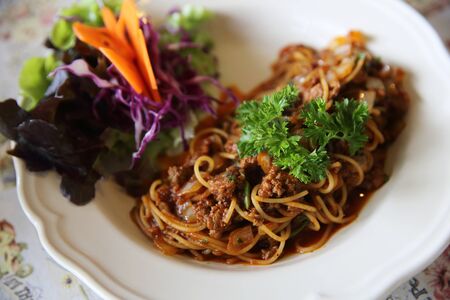 Spaghetti bolognese beef tomato sauce with vegetables italian foodの写真素材