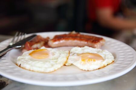 Breakfast Engligh Egg sausage and baconの写真素材