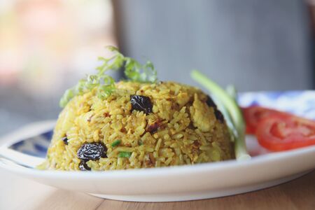 Pineapple fried rice , Fried rice with pineapple raisin chicken , Thai foodの写真素材