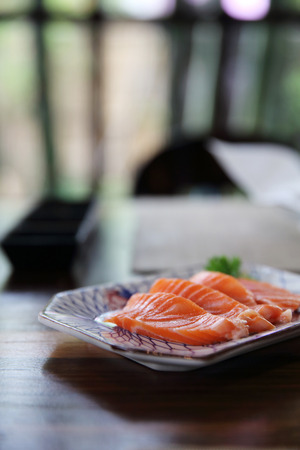 salmon sashimi in close upの写真素材
