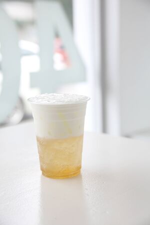 White cocktail in white backgroundの写真素材