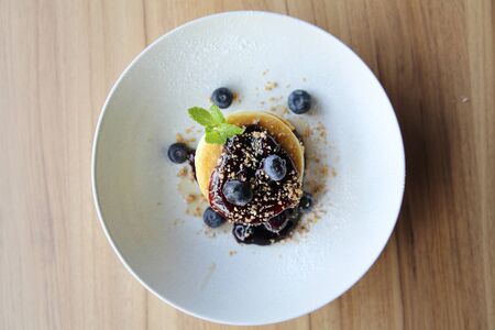 Blueberry pancake , Pancake topping with blueberries and icing dessertの写真素材