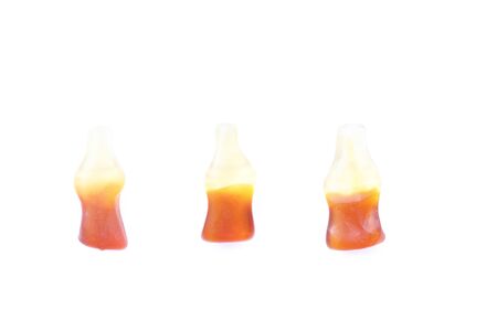 gummy candy with cola heart egg ring bear isolated in white background