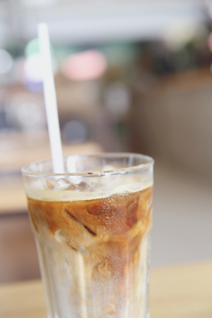 Iced coffee on wood backgroundの写真素材