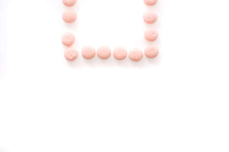 pink jelly candy isolated in white backgroundの写真素材