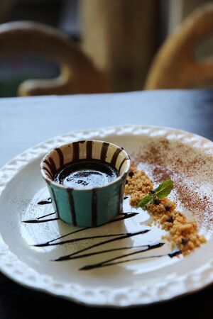 Chocolate lava cake on wood backgroundの写真素材