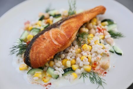 Baked salmon with bean Job's tears saladの写真素材
