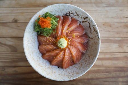 Salmon sushi don on wood background , Japanese foodの写真素材