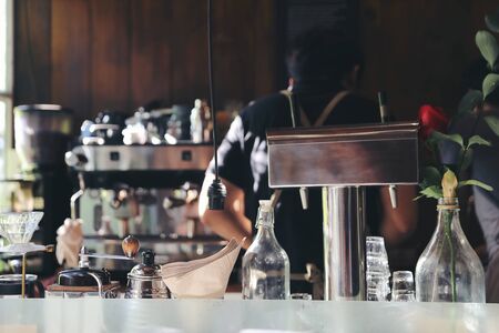 Barista Making Coffee in cafe with coffee machineの写真素材