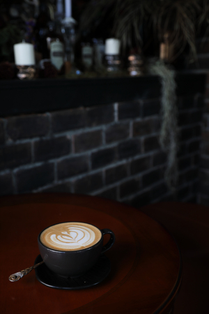 Cappuccino coffee break on wood backgroundの写真素材