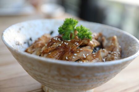 japanese food , Chicken teriyaki with rice on wood backgroundの写真素材