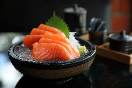Salmon sashimi on ice Japanese foodの写真素材