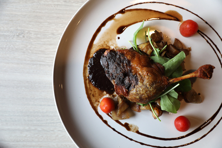 duck confit , Roasted Duck leg French food in top viewの写真素材