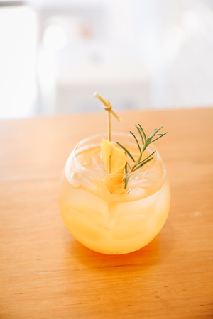 Orange juice on wooden tableの写真素材