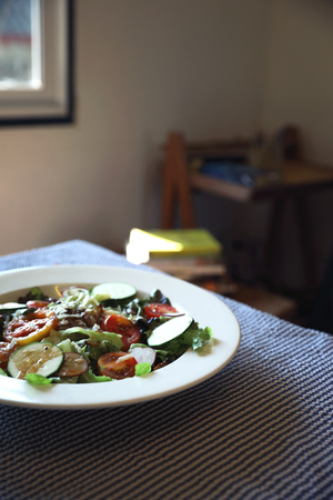 Fresh salad healthy food on tableの写真素材