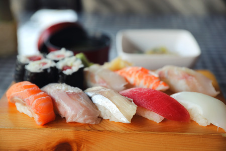 Sushi Set nigiri and sushi maki with tea served on wood and soup , Japanese foodの写真素材
