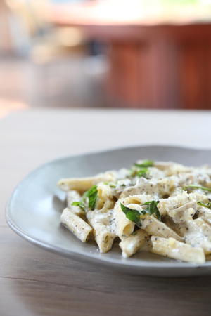 Penne pasta with white sauce and truffle , italian foodの写真素材
