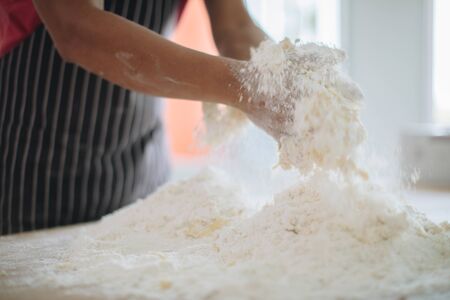 Making Handmade Noodles on wood backgroundの写真素材