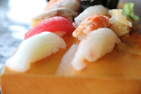 Sushi Set nigiri and sushi maki with tea served on wood and soup , Japanese foodの写真素材