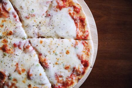 Pepperoni pizza on wood background, italian food traditional