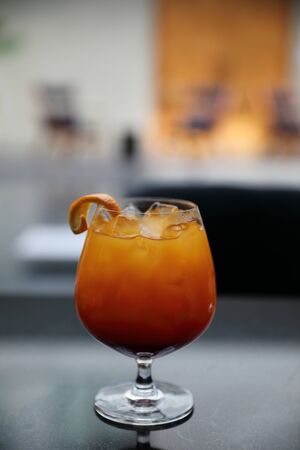 Sunrise Cocktail orange pineapple juice in restaurantの写真素材