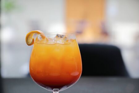 Sunrise Cocktail orange pineapple juice in restaurant