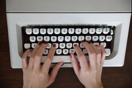 The Woman's Hands at The Typewriter の写真素材