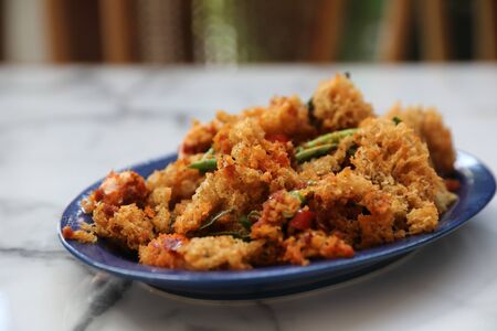 Crispy catfish stir fried thai local foodの写真素材