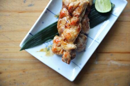 japanese food , Chicken yakitori on wood backgroundの写真素材