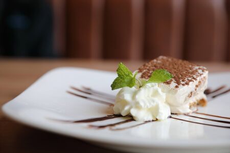 Tiramisu cake sweet dessert in close up