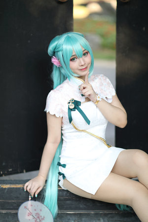 Japan anime cosplay portrait of a girl with chinese dress costume in chinese gardenの写真素材