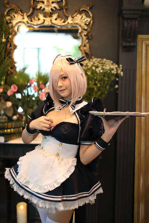 Japan anime cosplay portrait of girl with comic maid costumeの写真素材