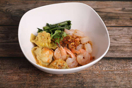 Shrimp dumpling with shrimp on wood backgroundの写真素材