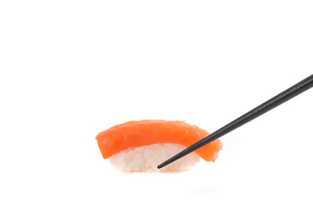 Salmon sushi with chopsticks Japanese food isolated in white backgroundの写真素材