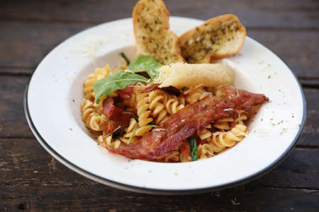fusilli pasta with bacon italian foodの写真素材