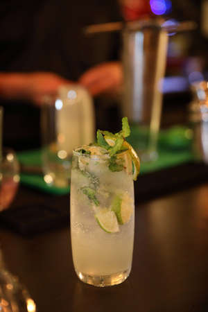 cocktails in glasses on bar counter in pup or restaurantの写真素材