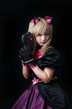 Japan anime cosplay , portrait of girl cosplay isolated in black background