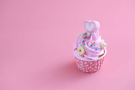 cupcake isolated in pink background