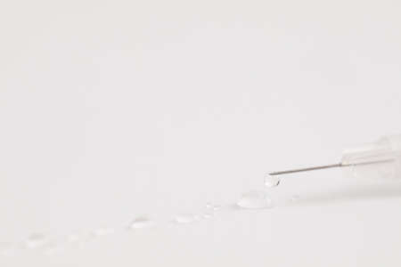 Syringe vaccine isolated in white backgroundの写真素材