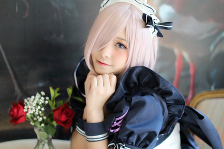 portrait of girl with japanese maid costume in vintage restaurantの写真素材