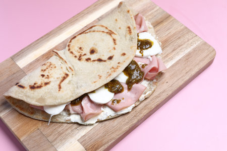 Italian cuisine , Piadina with Italian ham and cheeseの写真素材